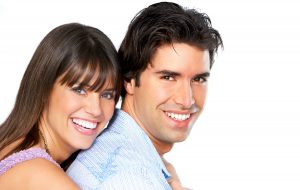 4218211 - happy smiling couple in love. over white background